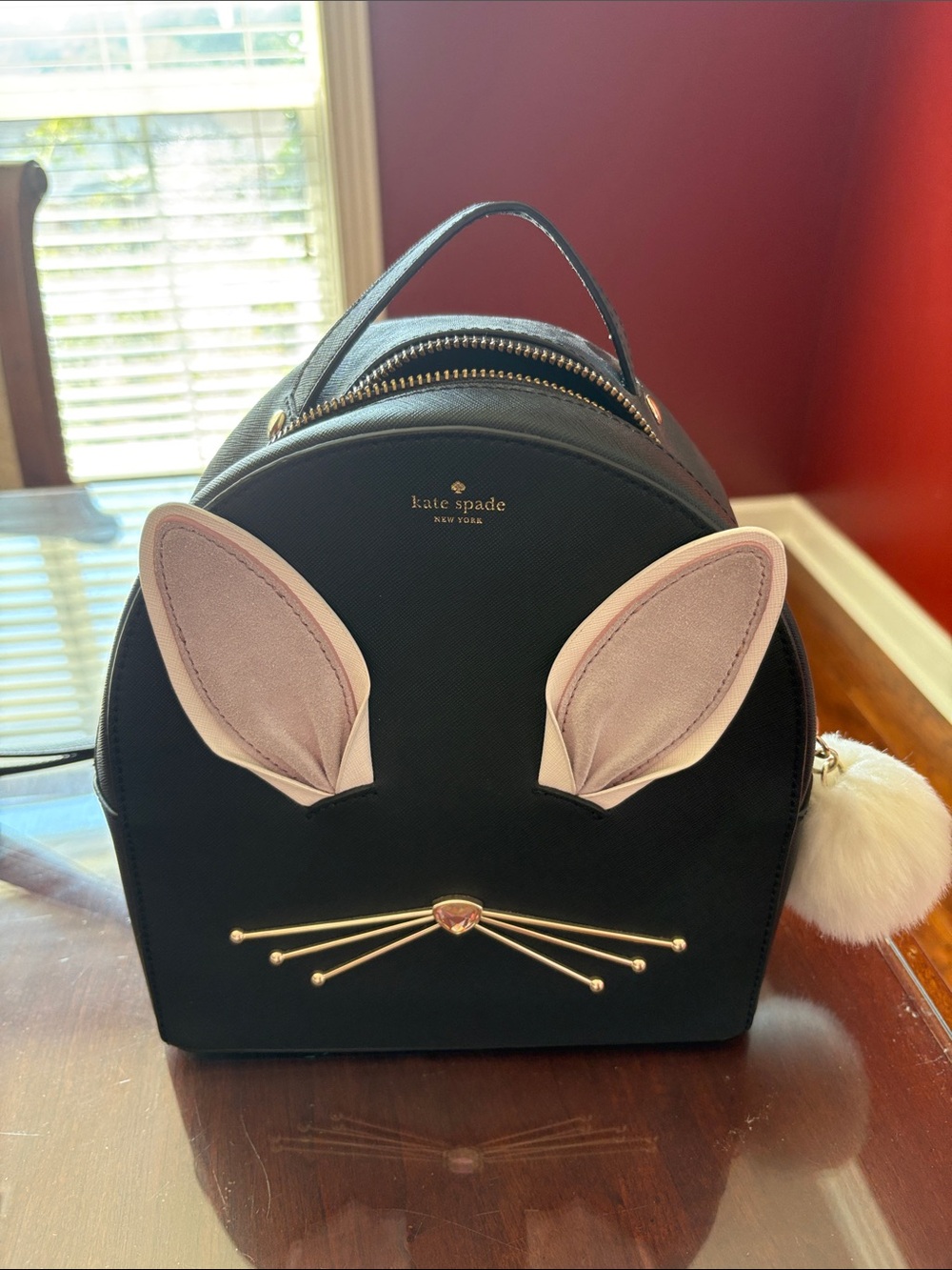 kate spade Black Backpack with Pink Ear Accents